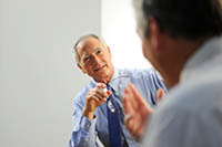 Two business men talking Peter Barron Stark Companies