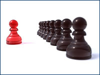 Chess pieces: one red and many black