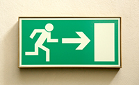 Exit sign to signify brain drain - Peter Barron Stark Companies